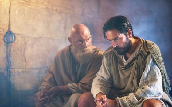 James Faulkner as Paul and Jim Caviezel as Luke are seen in the film "Paul, Apostle of Christ." (CNS/Sony Pictures)