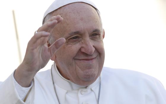 Pope Francis waves as he arrives for his general audience in St. Peter's Square at the Vatican March 14. (CNS/Paul Haring)