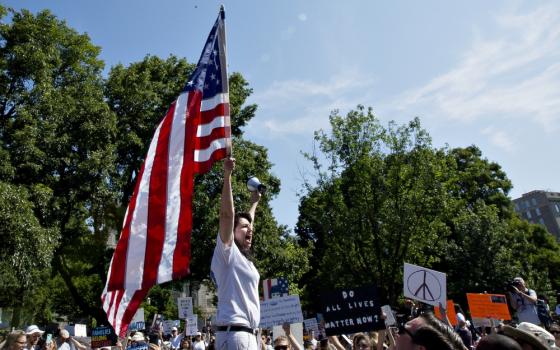 Demonstrators in Washington protest the Trump administration's immigration policy during a national day of action called "Keep Families Together" June 30. (CNS/Tyler Orsburn)