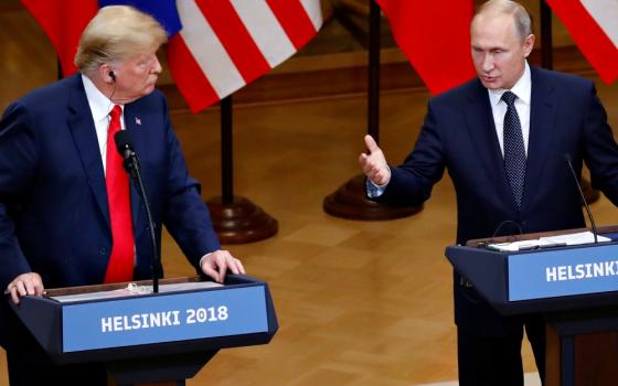 U.S. President Donald Trump and Russian President Vladimir Putin hold a joint news conference after their July 16 meeting in Helsinki, Finland. (CNS/Reuters/Leonhard Foeger)