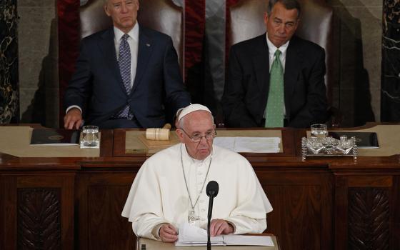 Pope Francis addresses a joint meeting of Congress in Washington Sept. 24, 2015. Also pictured are then-Vice President Joe Biden and then-House Speaker John Boehner, both of whom are Catholic. (CNS/Paul Haring)