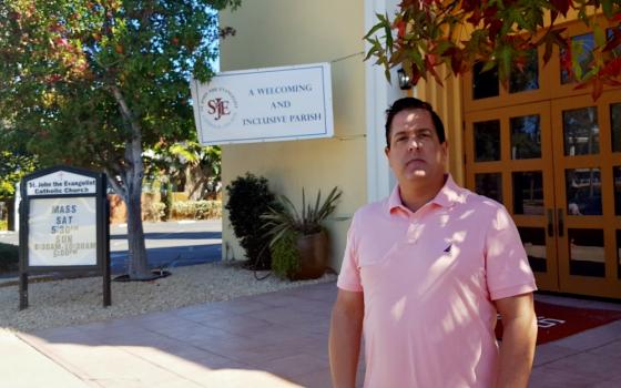 Aaron Bianco in front of St. John the Evangelist Parish in San Diego (NCR photo/Dan Morris-Young)