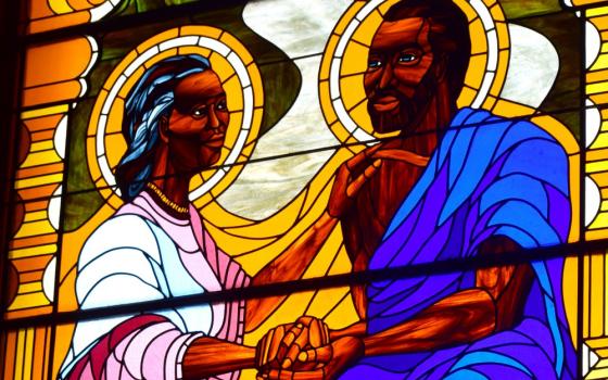 A stained-glass window depicting St. Augustine and his mother, St. Monica, graces the wall at St. Augustine Church in Washington, D.C. (CNS/Elizabeth Bachmann)