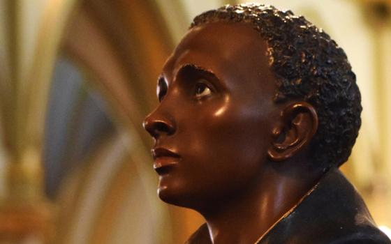 A statue of St. Martin de Porres stands at the entrance of St. Augustine Church in Washington, D.C. (CNS/Elizabeth Bachmann)