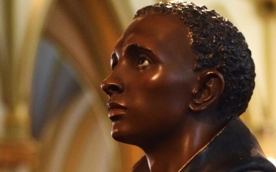 A statue of St. Martin de Porres stands at the entrance of St. Augustine Church in Washington, D.C. (CNS/Elizabeth Bachmann)