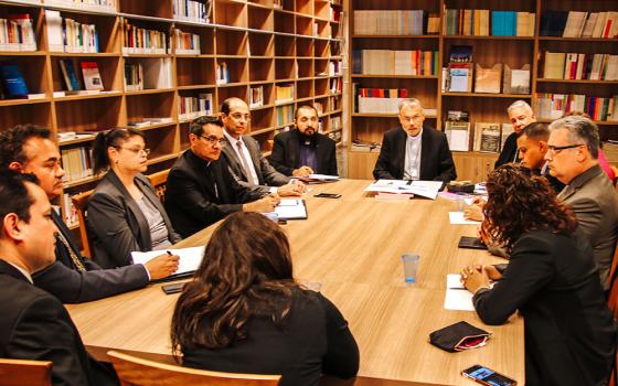 Encuentro representatives from the United States meet with German Bishop Franz-Peter Tebartz-van-Elst, delegate for catechesis at the Pontifical Council for the New Evangelization, at the Vatican Sept. 16, 2019. (CNS)