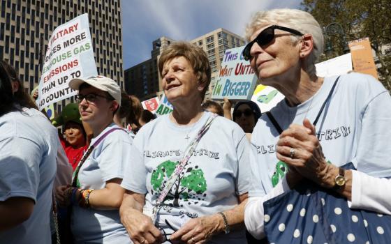 Sr. Helen Kearney, center, president of the Sisters of St. Joseph of Brentwood, New York, and St. Joseph Sr. Mary Doyle, right, participate in the Global Climate Strike in New York City Sept. 20, 2019. (CNS/Gregory A. Shemitz)