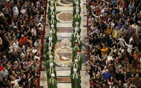 Bishops walk in procession as they arrive for the concluding Mass of the Synod of Bishops for the Amazon celebrated by Pope Francis at the Vatican Oct. 27. (CNS/Paul Haring)