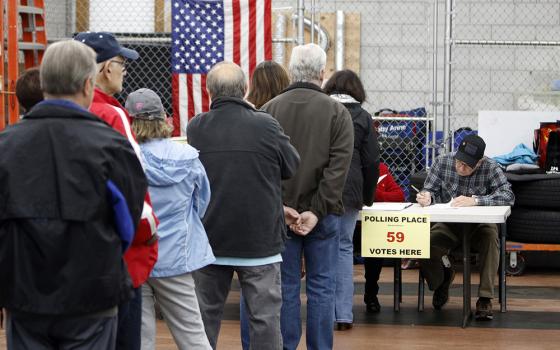 Voters line up prior to casting their ballots at a polling station in Nesconset, New York, on Election Day Nov. 6, 2018. (CNS/Gregory A. Shemitz)