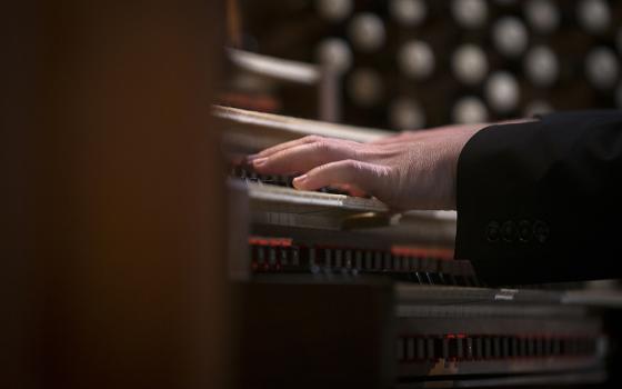 An organist rehearses at the Basilica of the National Shrine of the Immaculate Conception April 25, 2019, in Washington. (CNS/Tyler Orsburn)