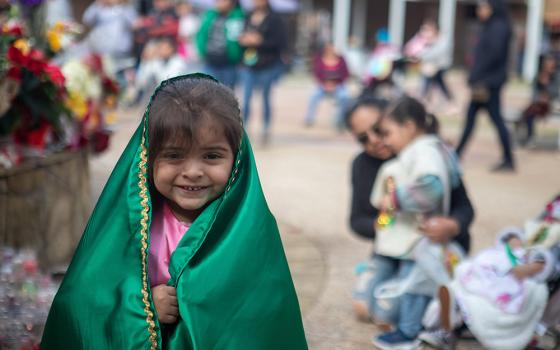 A young girl is dressed as Our Lady of Guadalupe outside Our Lady of Guadalupe Catholic Church in Houston Dec. 12, 2019. (CNS/Texas Catholic Herald/James Ramos)