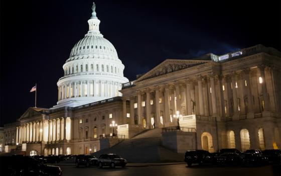 The U.S. Capitol in Washington is seen at night Jan. 21. The Senate debated the rules for the impeachment trial of President Donald Trump that same night. (CNS/Tyler Orsburn)