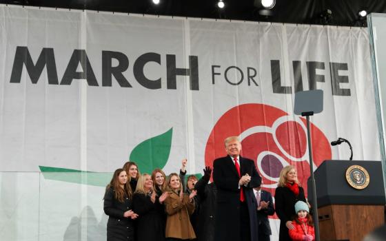 U.S. President Donald Trump applauds after addressing thousands during the 47th annual March for Life in Washington Jan. 24. (CNS/Reuters/Leah Millis)