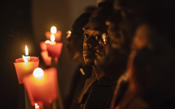 Religious hold candles as Pope Francis celebrates a Mass marking the World Day for Consecrated Life in St. Peter's Basilica at the Vatican Feb. 1, 2020. The Mass was celebrated on the vigil of the feast of the Presentation of the Lord. (CNS/Stefano Dal Po