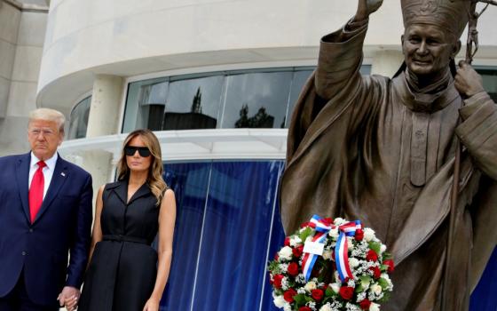 U.S. President Donald Trump and first lady Melania Trump pose during a visit to the St. John Paul II National Shrine in Washington June 2. (CNS/Reuters/Tom Brenner)