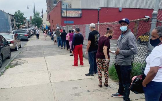 The line outside of the Fr. English Food Pantry in Paterson, New Jersey, stretches through several city blocks June 8 for people seeking food assistance from the program run by Catholic Charities of the Paterson Diocese. (CNS)