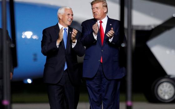 President Donald Trump and Vice President Mike Pence arrive at a campaign rally in Newport News, Virginia, Sept. 25. (CNS/Reuters/Tom Brenner)