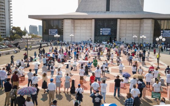 People in San Francisco attend an outdoor Catholic Mass during a "Free the Mass" demonstration Sept. 20. (CNS/San Francisco Archdiocese/Dennis Callahan)