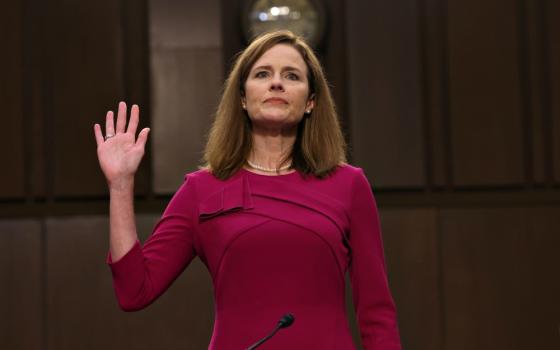 Judge Amy Coney Barrett, President Donald Trump's nominee for the U.S. Supreme Court, is sworn in for her confirmation hearing before the Senate Judiciary Committee on Capitol Hill in Washington Oct. 12. (CNS/Win McNamee, Pool via Reuters)