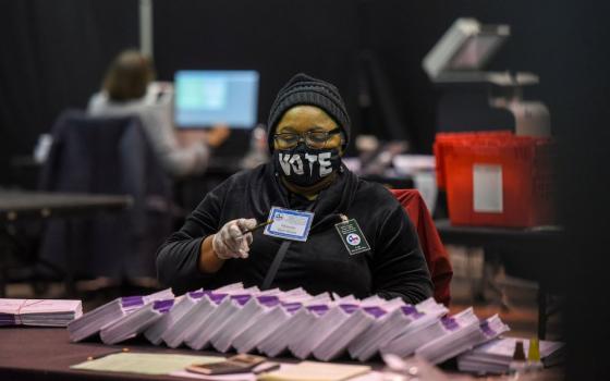 An election worker in Houston processes mail-in ballots Nov. 2, 2020. Election Day was Nov. 3. (CNS/Callaghan O'Hare, Reuters)