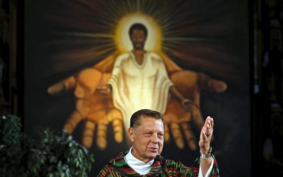 Fr. Michael Pfleger, pastor of St. Sabina Church in Chicago, is seen in this 2015 file photo. Cardinal Blase Cupich of Chicago asked the priest to step aside from ministry Jan. 5, after the Archdiocese of Chicago received an allegation he sexually abused 