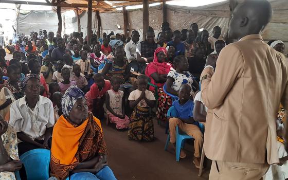 Oola Bosco, a catechist, teaches at the Palabek Refugee Settlement March 2021 in Uganda. Many of the refugees at the settlement are from South Sudan. (Courtesy of Lazar Arasu)