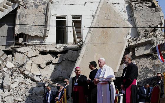 Pope Francis participates in a memorial prayer for the victims of the war at Hosh al-Bieaa (church square) in Mosul, Iraq, March 7. (CNS/Paul Haring)