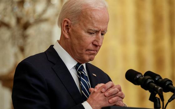 President Joe Biden holds his first formal news conference at the White House March 25 in Washington. (CNS/Leah Millis, Reuters)