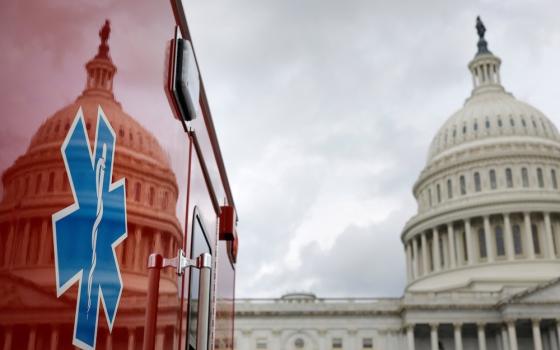 The U.S. Capitol is reflected on an ambulance July 16, 2020, in Washington. (CNS/Tom Brenner, Reuters)