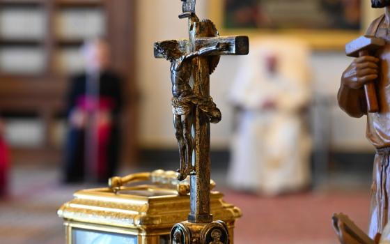 A crucifix is pictured as Pope Francis leads his general audience in the library of the Apostolic Palace at the Vatican April 14. Italy's highest court of appeal has ruled that public school classrooms can approve the presence of the crucifix.