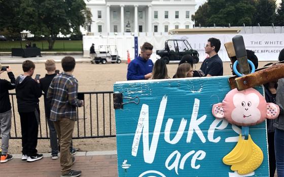 A sign denouncing nuclear weapons is seen near the White House in Washington Oct. 25, 2019. (CNS photo/Tyler Orsburn)