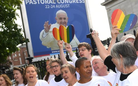 An LGBT choir sings outside the Pastoral Congress at the World Meeting of Families in Dublin Aug. 23, 2018. (CNS/Reuters/Clodagh Kilcoyne)