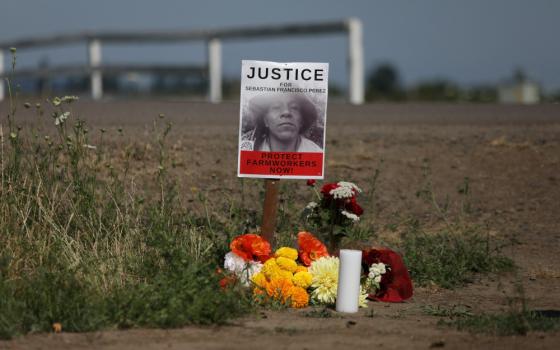 A makeshift memorial is seen in St. Paul, Ore., July 3, 2021, where Guatemalan-born farmworker Sebastian Francisco Perez died during the heat wave a week earlier while moving field irrigation lines. (CNS/Reuters/Alisha Jucevic)