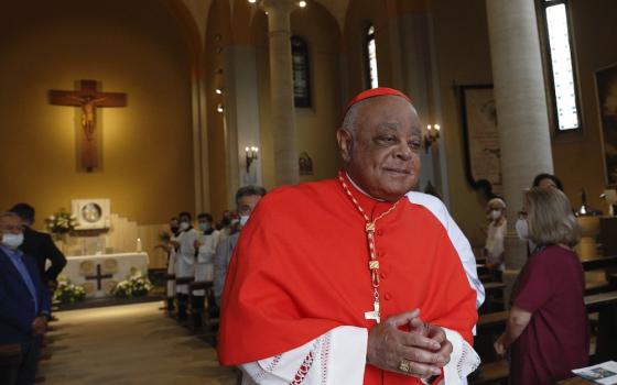 Cardinal Wilton Gregory of Washington leaves in procession after taking possession of his titular Church of the Immaculate Conception of Mary in the Grottarossa neighborhood of northern Rome Sept. 27. (CNS/Paul Haring)