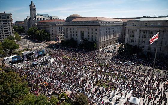 Supporters of legal abortion rally at Freedom Plaza in Washington before marching to the U.S. Supreme Court Oct. 2, during the nationwide Women's March protesting a new Texas law that bans most abortions after six weeks of pregnancy. (CNS/Reuters/Al Drago