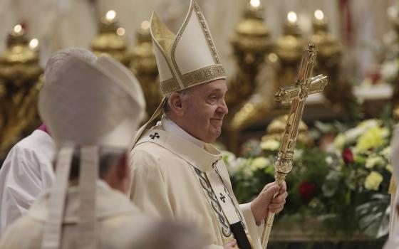 Pope Francis walks in procession during the ordination Mass for two new bishops in St. Peter's Basilica at the Vatican Oct. 17, 2021. (CNS photo/Romano Siciliani, pool)