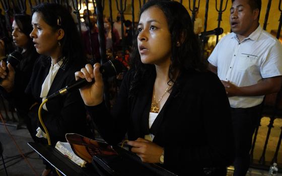 Members of the choir of Our Lady of Loretto Church in Hempstead, New York, sing during a Spanish-language Mass Sept. 6, 2021, at Immaculate Conception Seminary in Huntington, New York. (CNS/Gregory A. Shemitz)