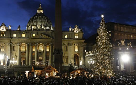 The Christmas tree sparkles after a lighting ceremony in St. Peter's Square at the Vatican in this Dec. 5, 2019, file photo.  (CNS photo/Paul Haring)