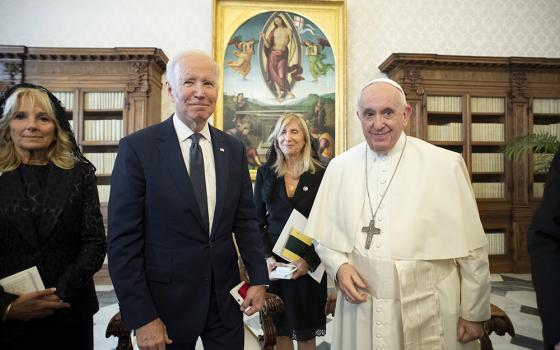 U.S. President Joe Biden, accompanied by his wife, Jill, is pictured with Pope Francis during a meeting Oct. 29 at the Vatican. (CNS/Vatican Media)