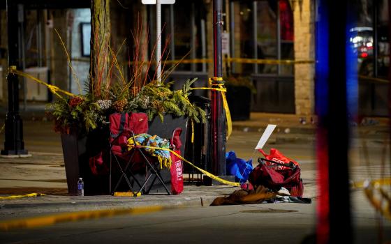 Chairs left abandoned are seen Nov. 22, 2021, after a car plowed through the Waukesha Christmas Parade in Waukesha, Wis., at about 4:39 p.m. local time Nov. 21. (CNS photo/Cheney Orr, Reuters)