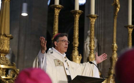 Archbishop Michel Aupetit of Paris celebrates the annual chrism Mass at historic St. Sulpice Church April 17, 2019.