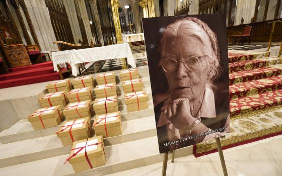 Sealed archival boxes containing documents related to Dorothy Day's canonization cause are seen in the sanctuary following a Mass Dec. 8, 2021, at St. Patrick's Cathedral in New York City. (CNS photo/Gregory A. Shemitz)