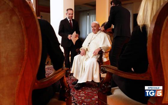 Pope Francis is interviewed at his Vatican residence by adults facing challenging experiences in their lives for a program broadcast on Italian television Channel 5, Mediaset, Dec. 19, 2021. (CNS photo/courtesy Mediaset)