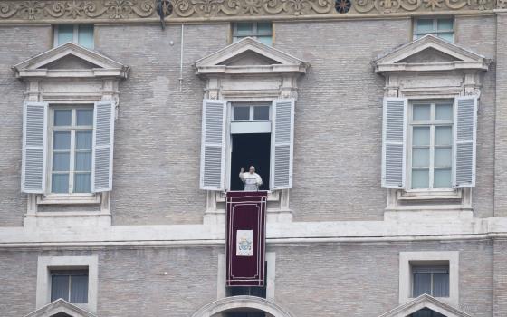 Pope Francis leads the Angelus from the window of his studio overlooking St. Peter's Square at the Vatican Jan. 3, 2021.  (CNS photo/Vatican Media)