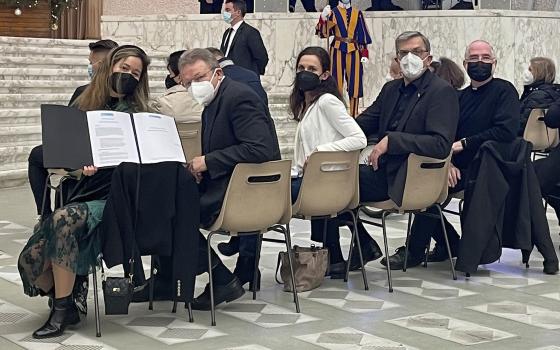 A group of pilgrims who presented a "Faith Manifesto" to Pope Francis are pictured during the pope's general audience at the Vatican Jan. 5, 2022. (CNS photo/courtesy Initiative Neuer Anfang)