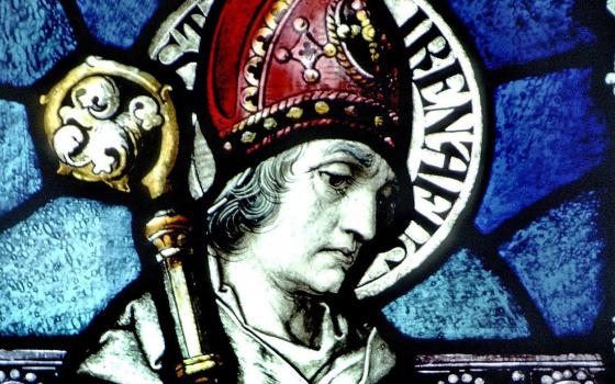 St. Irenaeus of Lyon is pictured in a stained-glass window at the Basilica of Our Lady Immaculate in Guelph, Ontario. (CNS photo/The Crosiers)