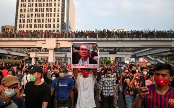 Demonstrators protest the military coup and demand the release of elected leader Aung San Suu Kyi in Yangon, Myanmar, Feb. 6, 2021. (CNS photo/Reuters)