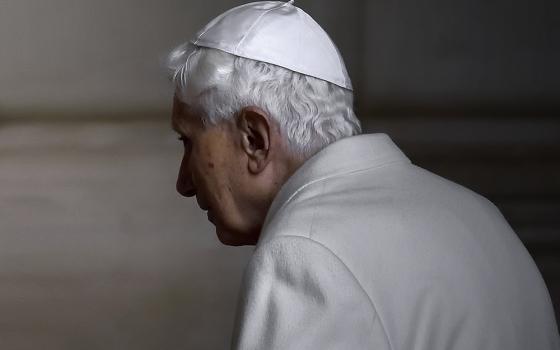 Pope Benedict XVI attends the opening of the Holy Door to inaugurate the Jubilee Year of Mercy, in St. Peter's Basilica at the Vatican in this Dec. 8, 2015, file photo. (CNS/Stefano Spaziani, pool)