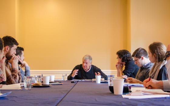 Paul Mariani, a Catholic poet at Boston College gives a master class to graduate students at the Lumen Christi Institute at the University of Chicago. (CNS photo/Mark Franzen, Lumen Christi Institute)