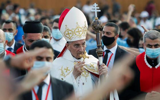 Cardinal Bechara Rai, Maronite patriarch, arrives to celebrate a Mass to mark the one-year anniversary of Beirut's port blast Aug. 4, 2021. The blast killed killed over 200 people, injured 7,000, left 300,000 homeless. (CNS/Reuters/Mohamed Azakir)